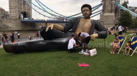 A 25ft half-naked Jeff Goldblum appeared in front of London's Tower Bridge and promptly got damaged