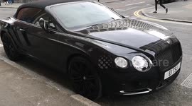Bentley with parking ticket