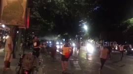Tension near Paris' Champs-Elysées as locals flee riot police after France's World Cup win
