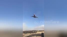 Plane drops retardant on 45,000-acre Substation wildfire
