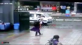 Moment children are forced to flee a burning school bus after it catches alight.