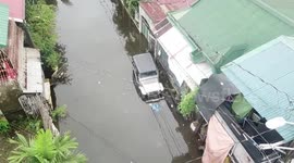 Drone footage reveals the Philippines city submerged by Typhoon Henry