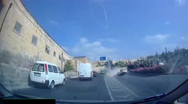 Car flips onto roof after failing to make motorway turn-off