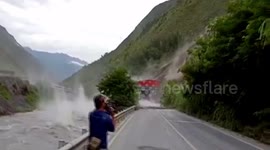 Huge rocks hurtle down mountain after downpour in China