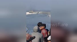 Moment heavy waves cause boat to capsize leaving seven dead