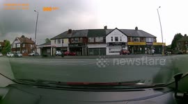 Dash cam captures illegal bike on the wrong side through red lights ,Prestwich