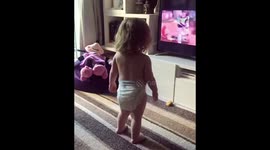Toddler dancing to music
