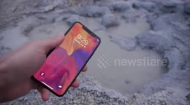 Watch what happens when you dip an iPhone X into a boiling mud pool