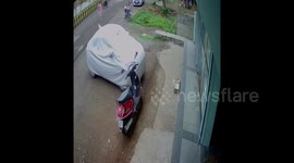 Lucky escape for scooter girl in bus smash
