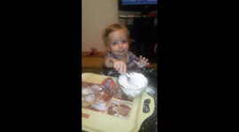 Cute baby are playing with sugar