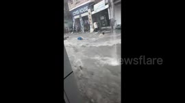 Man heroically steps into raging waters to save little girl