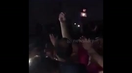Iraqi protesters take an Iranian cleric as hostage.