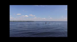 Epic drone footage of tubers being towed by boat