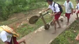 Indonesian kids make bicycles out of wood and bamboo