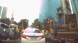 Look before you open a taxi door! Motorcyclist collides with vehicle when passenger steps out without checking first