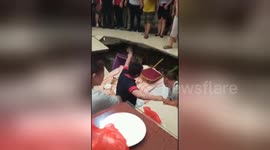 Carnage after hotel floor collapses at wedding ceremony