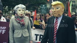 Donald Trump and Theresa May costumes, satirical, at Stop Trump Protest, London, 13th July
