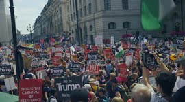 Protest Trump's Visit, Stop Trump March in London. Signs and large crowds protest Donald Trump's visit to the UK in London.