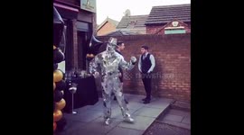 Human disco ball shimmers as he dances