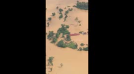 Aerial footage shows villages completely submerged