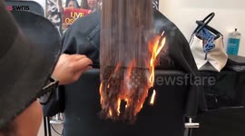 Stylist sets client’s hair on fire