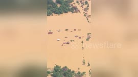 Aerial footage shows Laos villages completely submerged after dam collapse