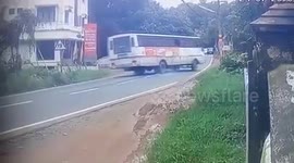 Dramatic moment bus topples over trying to avoid tuk-tuk, injuring 16