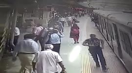 Moment woman was saved by commuters when her dress got stuck in a train door