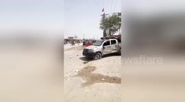 Aftermath of explosion at Pakistan poling station that killed 31