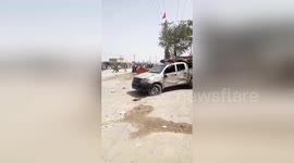 Aftermath of explosion at Pakistan poling station that killed 31