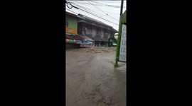 Buses struggle as storms turn road into raging river