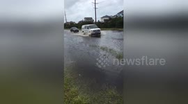 Heavy rains flood streets in North Carolina