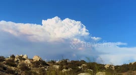 Time lapse shows smoke cloud from fast-moving Cranston Fire