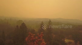 40,000-acre Ferguson Fire shrouds Yosemite National Park in smoky yellow hue