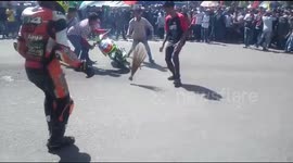 Moment motorcycle catches fire during race