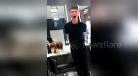 RAW: Hair stylist’s flashy dance moves lead to epic pants fail