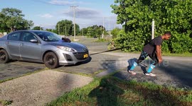 Honduran Boy Pulls A 3000LB Car On Back