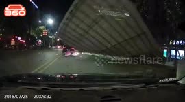 Video captures moment shutter falls onto road and crushes scooter during storm