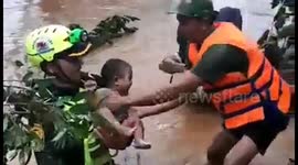 Moment four-month-old baby is rescued from Laos flood