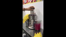 Deli guy making organic juice