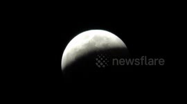 Filmer in South Africa captures initial phase of total lunar eclipse