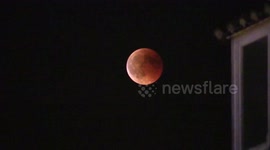 ‘Blood moon' seen over the night sky of Madrid