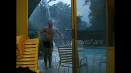 Man Dances in the Rain