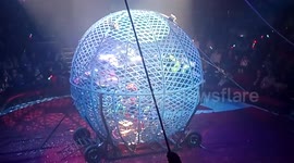 Five motorcycles in a cage ball at Hippodrome Circus in Great Yarmouth