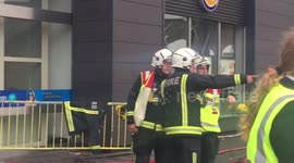 Torrential rain causes flooding at a shopping centre in Stratford, London