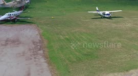 4 K aerial view airplanes parked