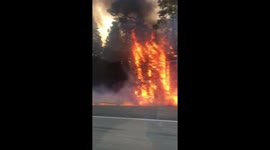 Video shows fire burning scarily close to highway in Washington county
