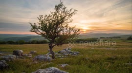 Time lapse of a lovely summer sunset in the Yorkshire Dales at the popular tourist attraction of Winskill Stones, near Settle
