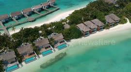 Drone footage maldives water villa kuramathi