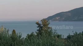 Huge Fire in Zakynthos.  Airplanes fill water